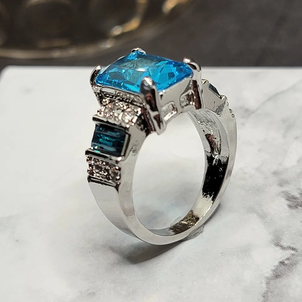 Silver Tone Simulated Blue Topaz Gemstone Ring
